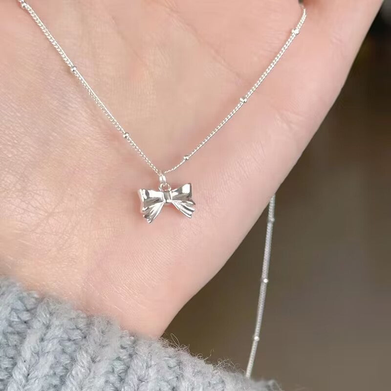 UNI-10274 - Bow Silver - Necklace