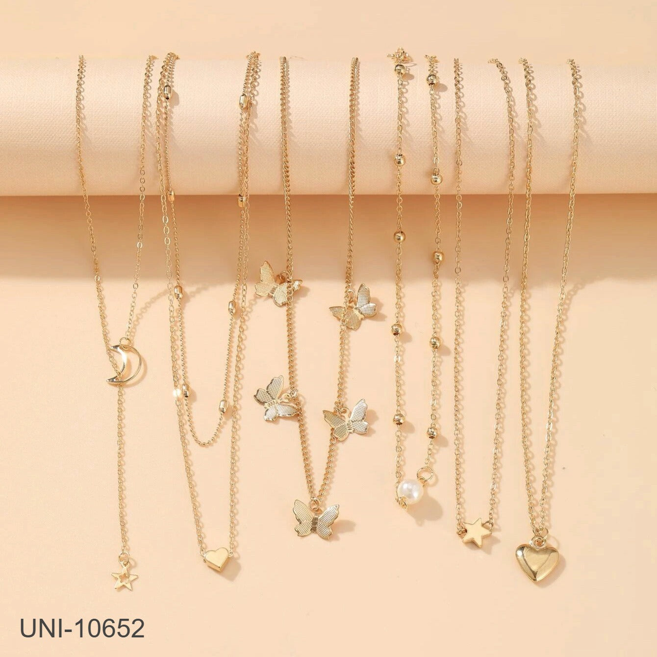 UNI-10652 - Pearl & Butterfly Gold - Necklace Set Of 6