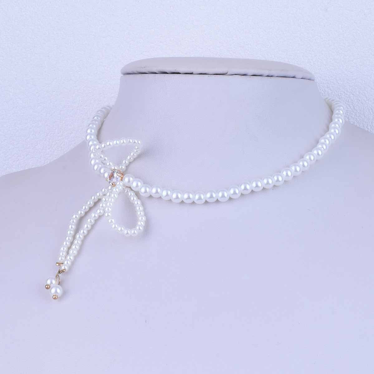 UNI-10509 - Pearly Bow - Necklace