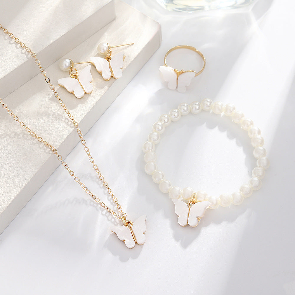 UNI-10555 - White Butterfly Pearl Gold - Jewelry Set