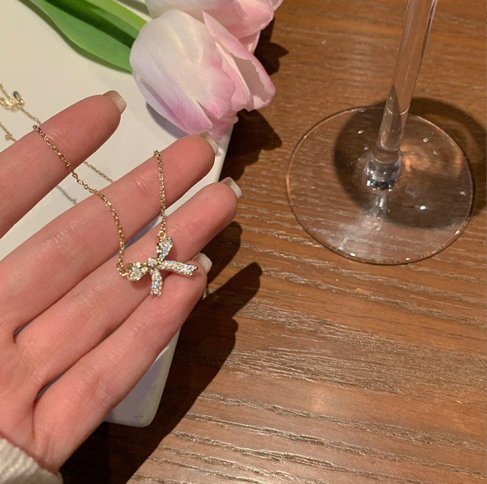 UNI-10233 - Bow Sparkle Gold - Necklace
