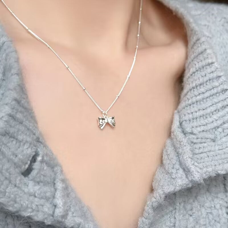 UNI-10274 - Bow Silver - Necklace