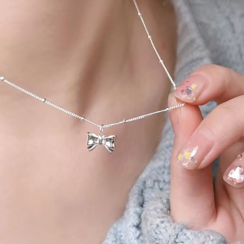 UNI-10274 - Bow Silver - Necklace