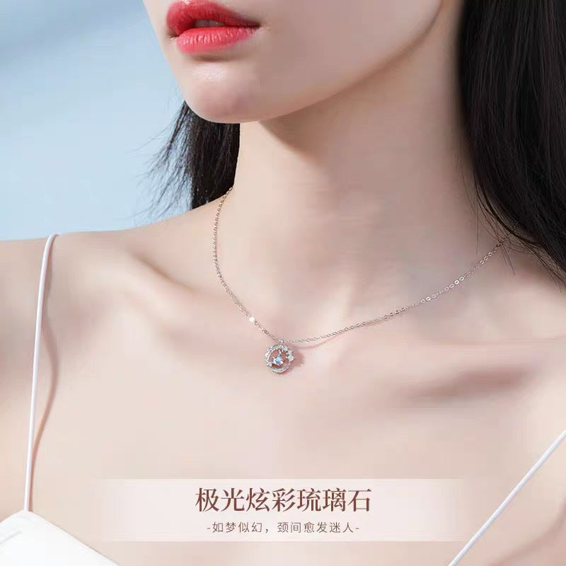 UNI-10285 - Blue Diamond Feather Circle - Necklace